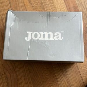 Mens size 9.5 soccer cleats new with tag. White and gold